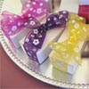 Favor boxes with cherry blossom ribbons